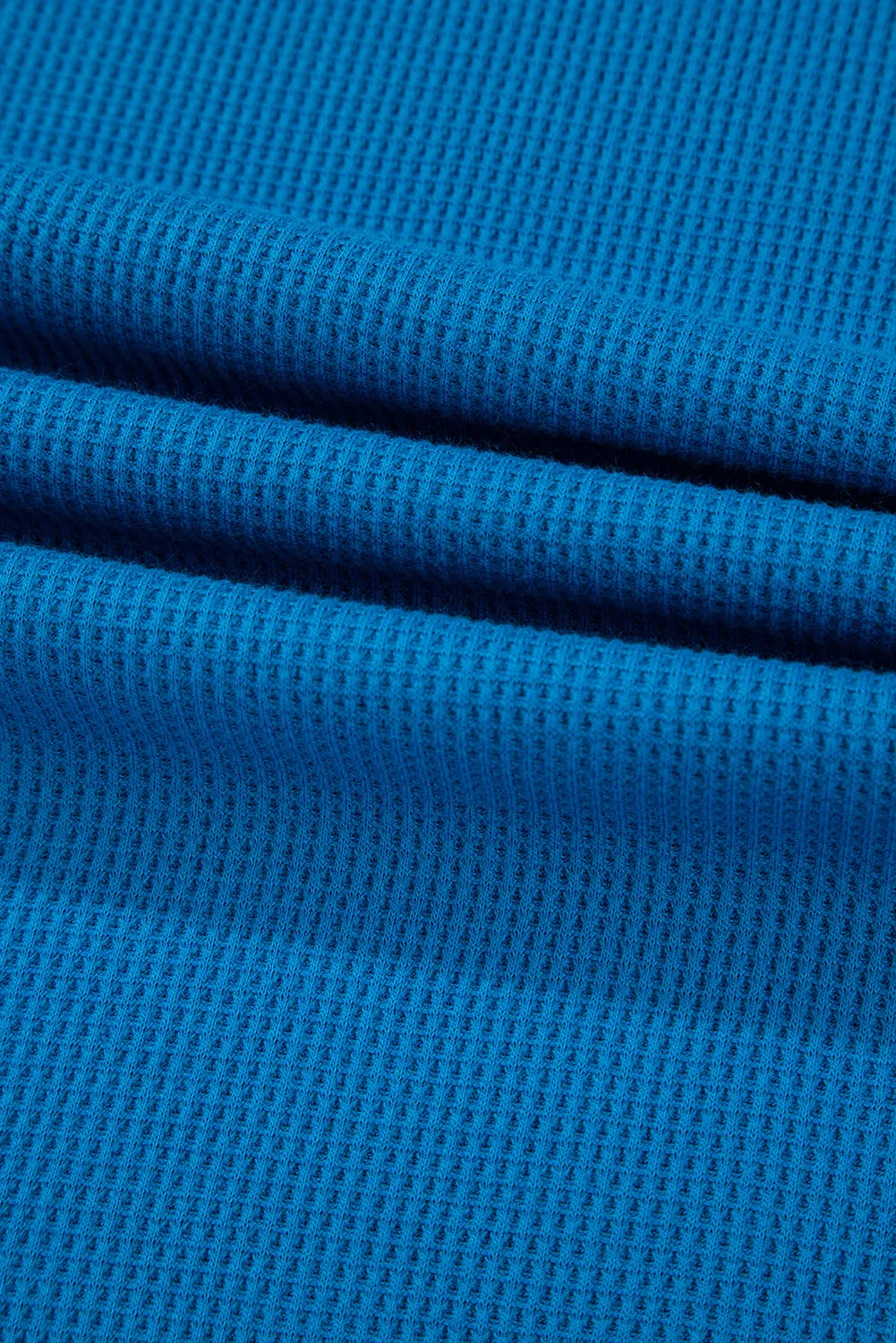Chemisier en tricot ctelé à col en V et manches patchwork floral en dentelle bleu ciel